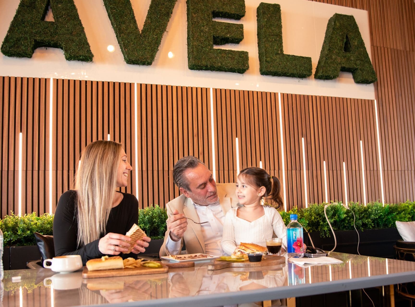 A family over paninis